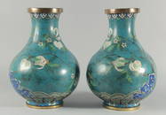 A FINE PAIR OF LARGE CHINESE BLUE GROUND CLOISONNE VASES, decorated with peach blossom above a band