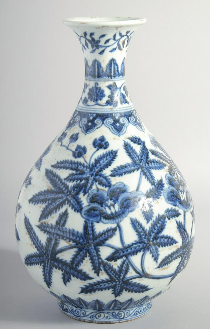 A CHINESE BLUE AND WHITE PORCELAIN YUHUCHUN VASE, with foliate decoration, base with six-character: A CHINESE BLUE AND WHITE PORCELAIN YUHUCHUN VASE, with foliate decoration, base with six-character mark, 23cm high.