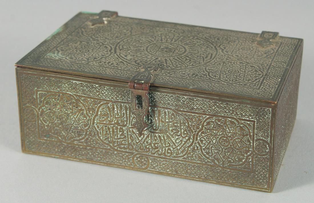 A 19TH CENTURY SYRIAN DAMASCUS ENGRAVED BRASS QURAN BOX, with panels of calligraphy, 14cm x 9cm.: A 19TH CENTURY SYRIAN DAMASCUS ENGRAVED BRASS QURAN BOX, with panels of calligraphy, 14cm x 9cm.