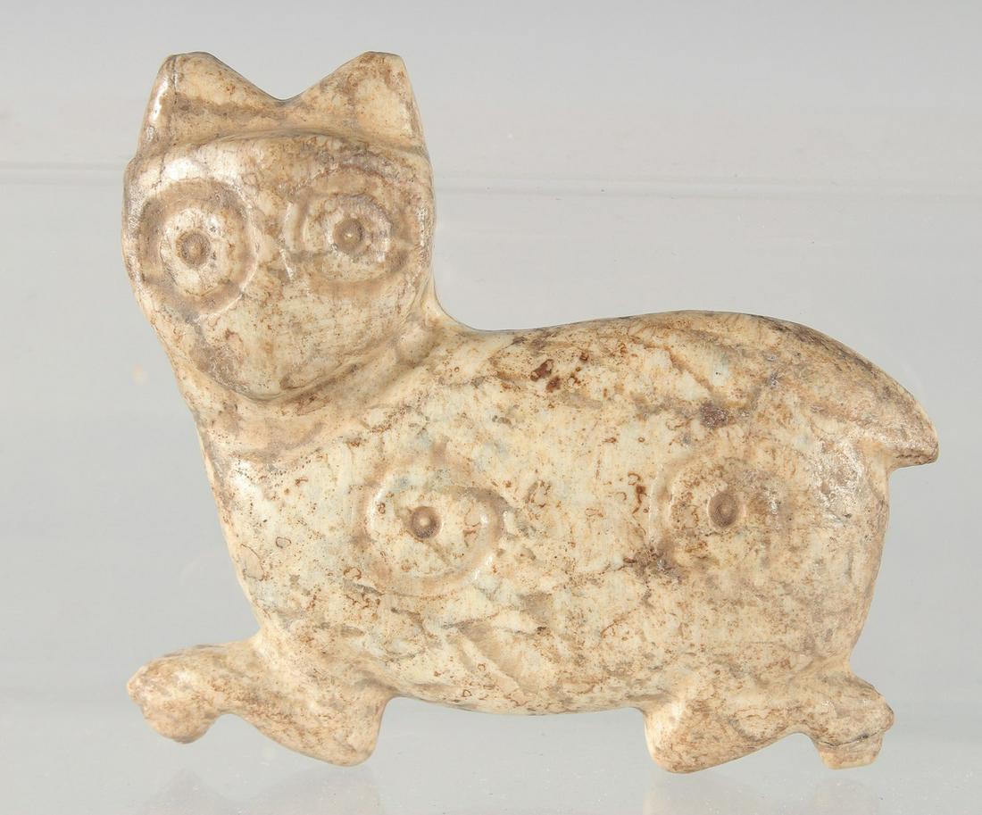 A RARE EARLY ISLAMIC - POSSIBLY PERSIAN GHAZNAVID, CARVED MARBLE CAT, 12cm at widest point.: A RARE EARLY ISLAMIC - POSSIBLY PERSIAN GHAZNAVID, CARVED MARBLE CAT, 12cm at widest point.