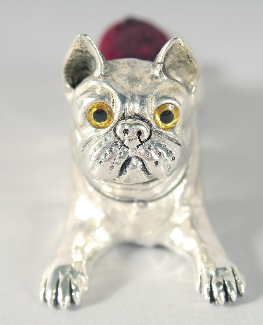A SILVER-PLATED FRENCH BULLDOG PIN CUSHION. 8cm: A SILVER-PLATED FRENCH BULLDOG PIN CUSHION. 8cm