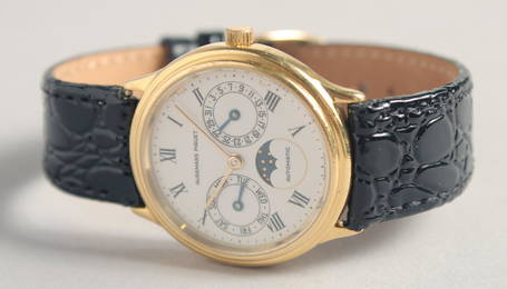 A SUPERB AUDEMARS PIQUET 18CT YELLOW GOLD DAY DATE MOONFACE WRISTWATCH.  No. 18357 with a leather