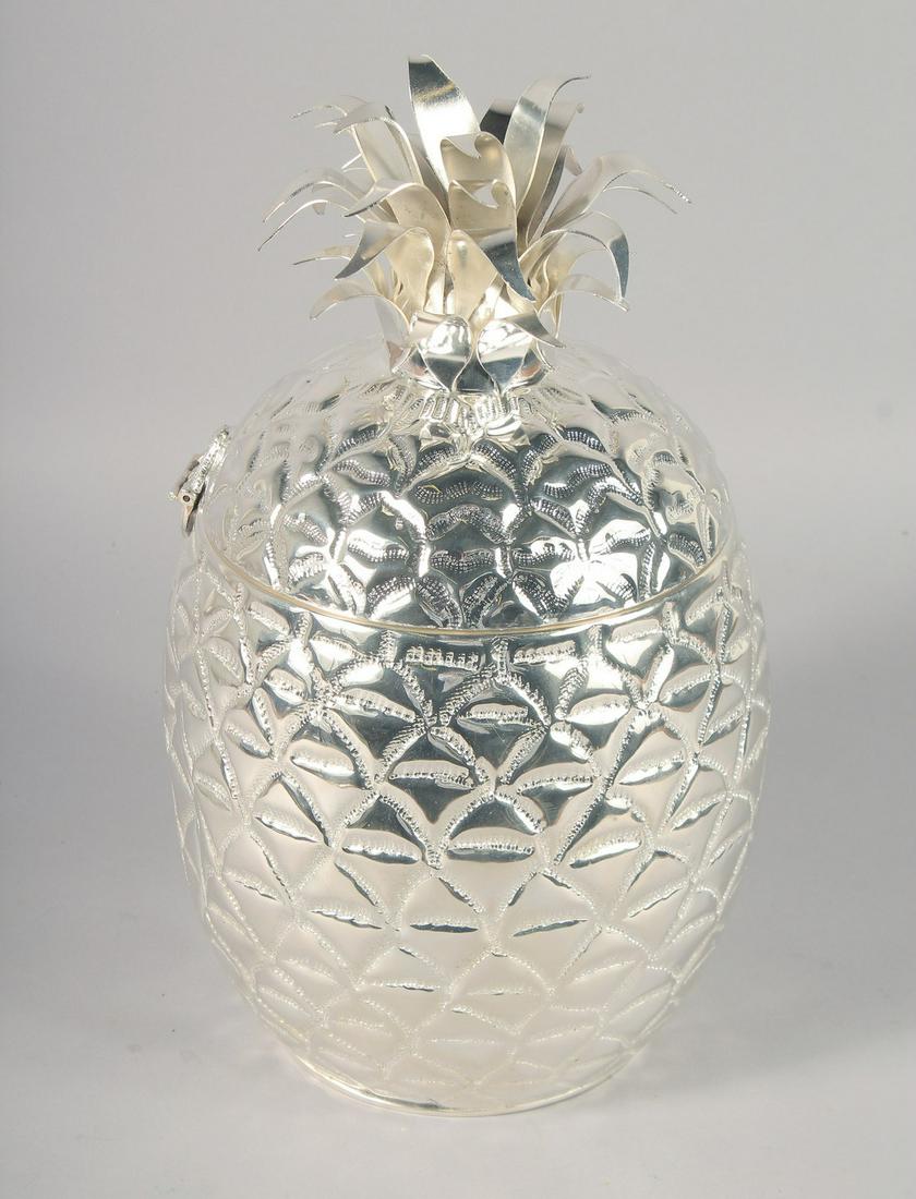 A PINEAPPLE SHAPED PLATED ICE BUCKET. 13" high: A PINEAPPLE SHAPED PLATED ICE BUCKET. 13" high