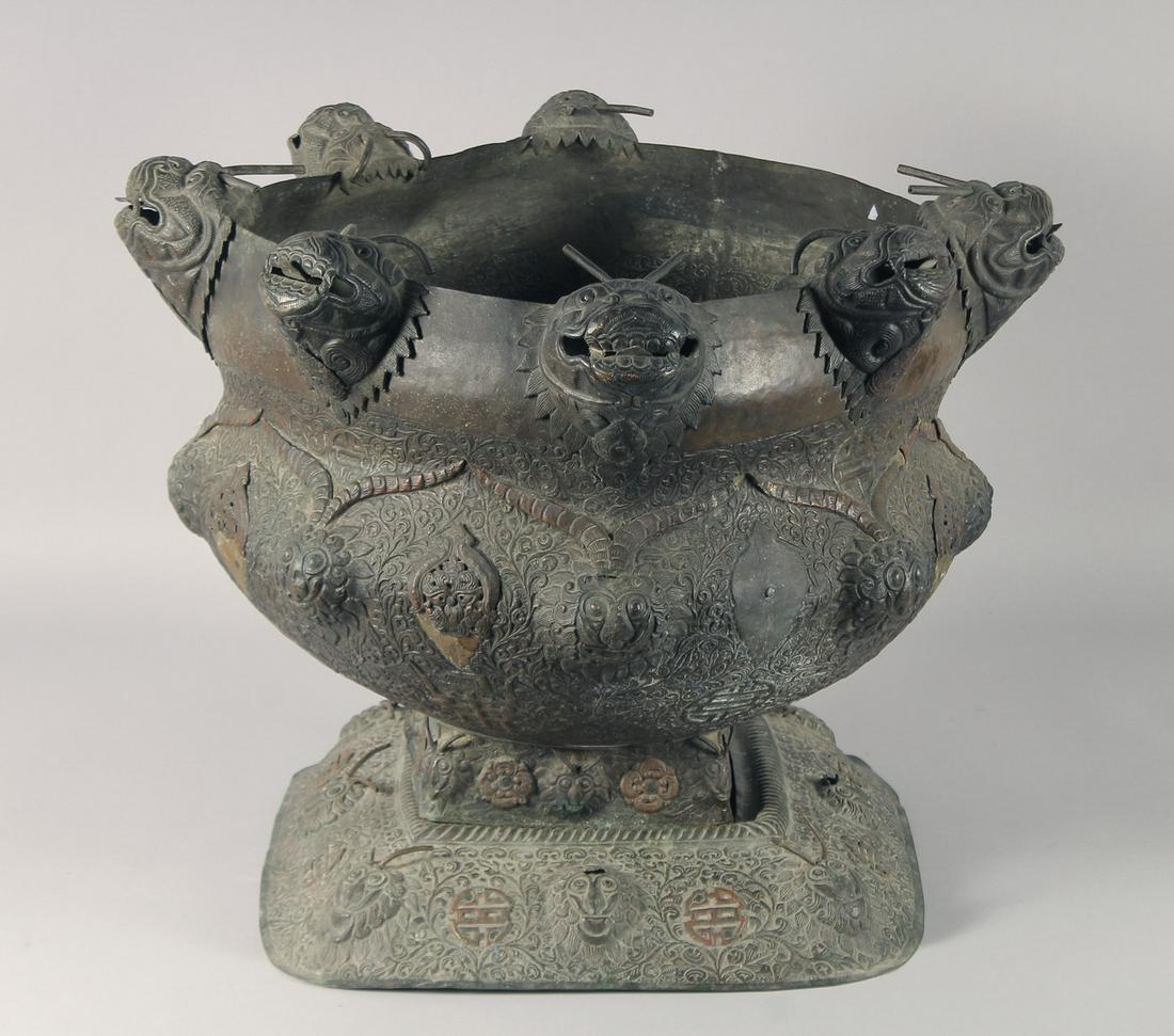 AN UNUSUAL CHINESE MARKET METALWORK CENTRE PIECE, with European stamp, standing on a fitted square (1 of 7)