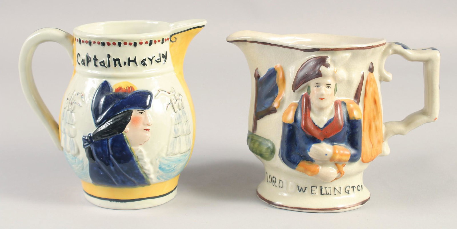 A LORD WELLINGTON & NELSON JUG. 6ins & 5.75ins high.: A LORD WELLINGTON & NELSON JUG. 6ins & 5.75ins high.