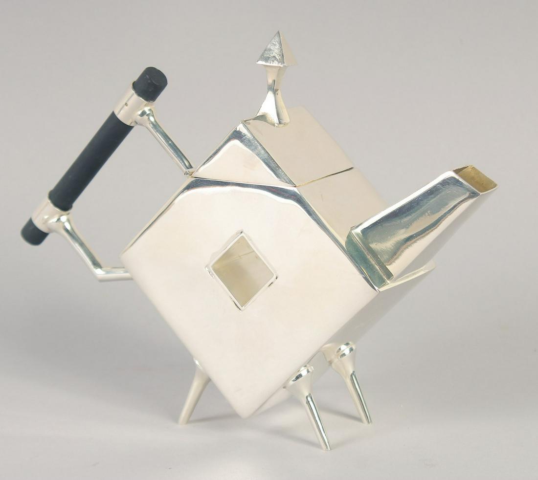 A CHRISTOPHER DRESSER STYLE SILVER PLATED SQUARE TEA POT.: A CHRISTOPHER DRESSER STYLE SILVER PLATED SQUARE TEA POT.