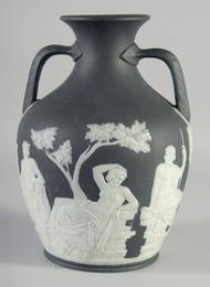 A GOOD BLACK AND WHITE JASPER WARE PORTLAND VASE.  Circa. 1780.  10.5ins high, the base with the