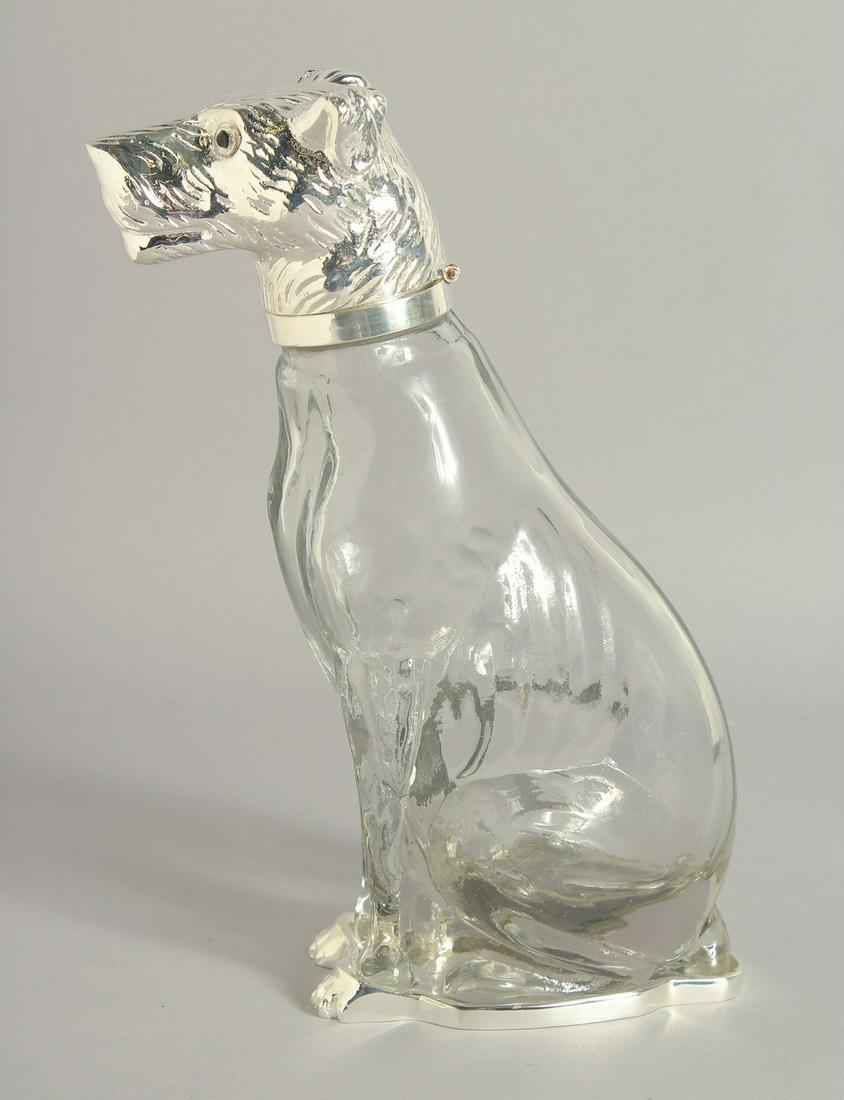 A SILVER PLATED DOG CLARET JUG.  9.5ins high. (1 of 1)