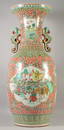 A VERY LARGE CHINESE POLYCHROME TWIN HANDLE VASE, with two large panels of warriors on horseback and