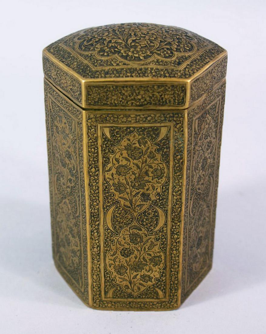 A 19TH CENTURY QAJAR ENGRAVED BRASS HEXAGONAL BOX, with decoration of floral motif, 12.5cm high. (1 of 7)