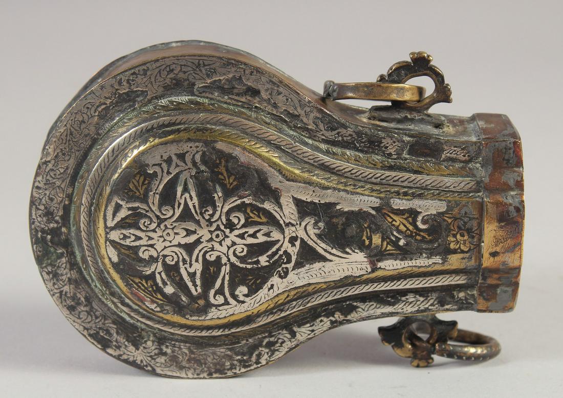 A SILVER INLAID BRASS POWDER FLASK, 14cm long. (1 of 4)