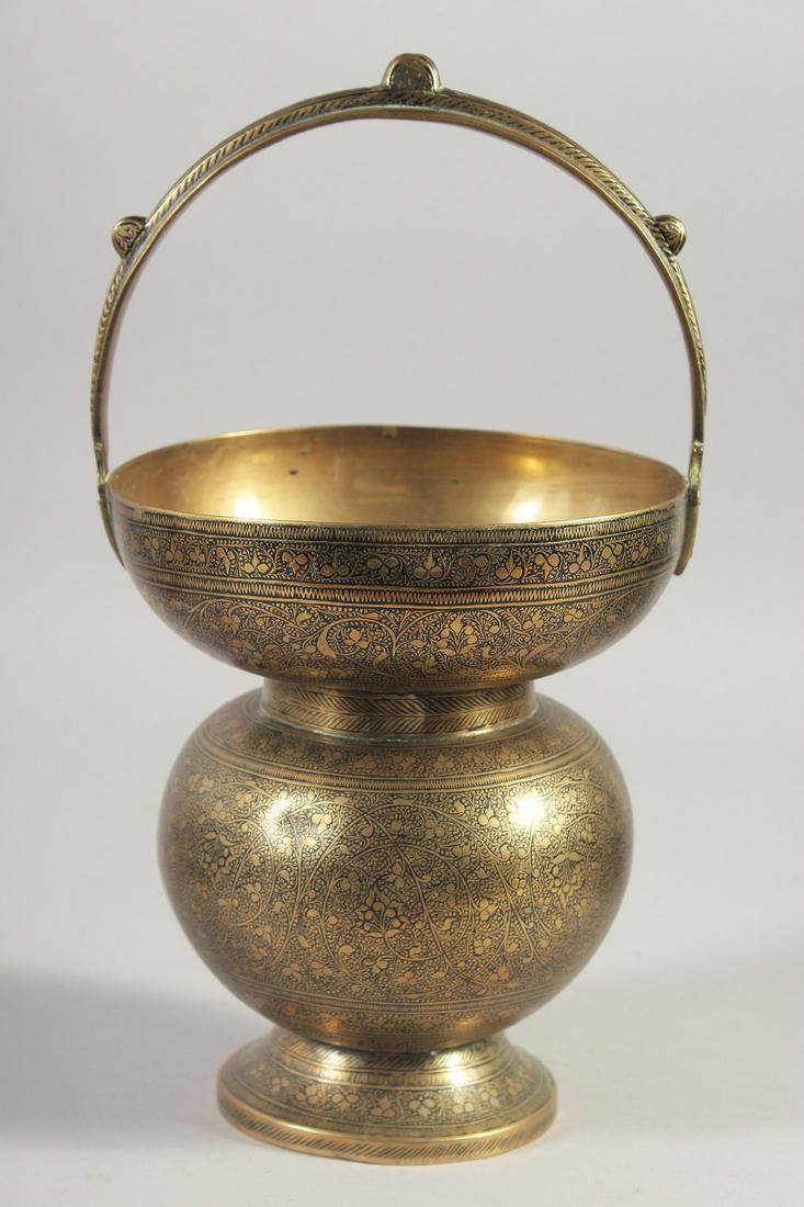 AN ENGRAVED BRASS SPITTOON, 29cm high.: AN ENGRAVED BRASS SPITTOON, 29cm high.