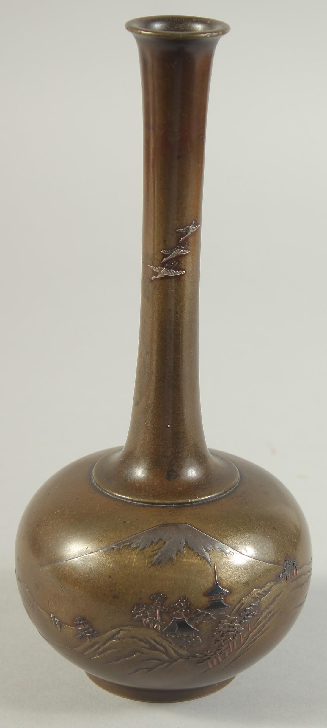 A JAPANESE MEIJI PERIOD BRONZE BOTTLE VASE, Nogawa mark, with mixed metal decoration depicting mount (1 of 6)