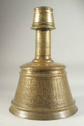 A RARE MONUMENTAL 14TH-15TH CENTURY MAMLUK ENGRAVED BRASS CANDLESTICK, depicting fine large-scale