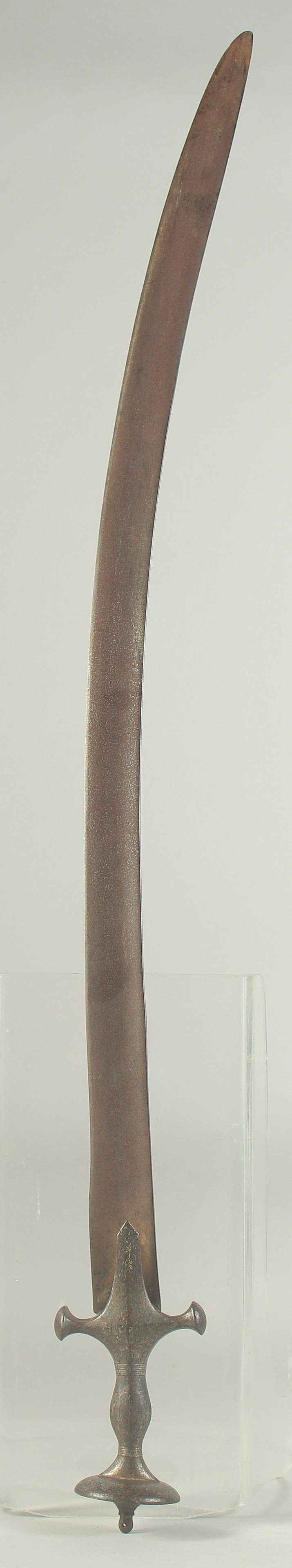 A 19TH CENTURY INDIAN TALWAR SWORD, with silver inlaid handle, 87cm long. (1 of 4)