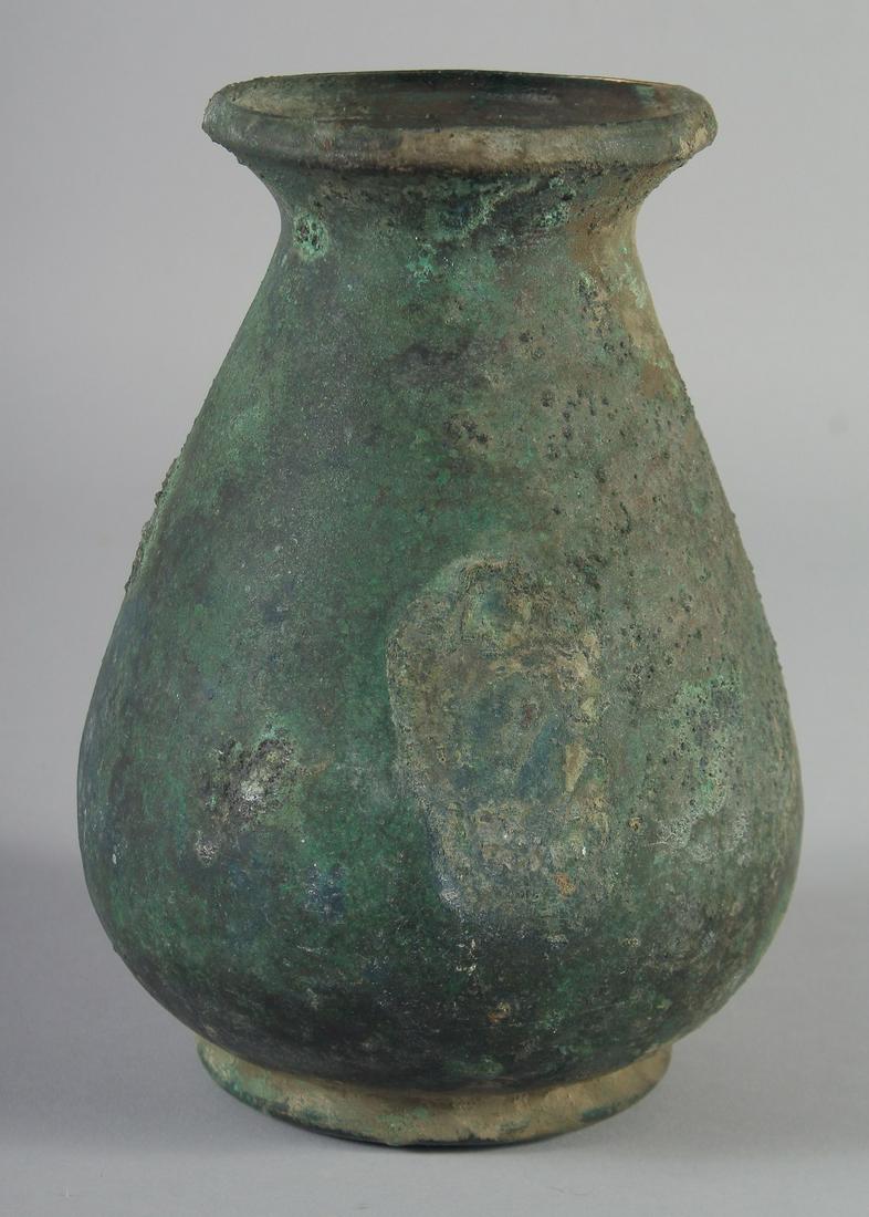 AN UNUSUAL ANCIENT PERSIAN OR ROMAN VASE, 19.5cm high. (1 of 5)