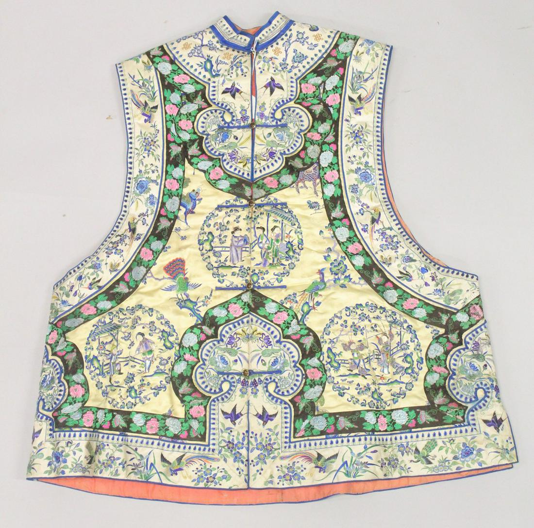 A CHINESE EMBROIDERED SILK WAISTCOAT, with fine embroidered panels of female figures, further (1 of 7)