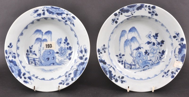 A PAIR OF 18TH CENTURY CHINESE NANKING CARGO BLUE : A PAIR OF 18TH CENTURY CHINESE NANKING CARGO BLUE AND WHITE DISHES painted with flowering rock. Good condition. (No. 193). 9ins diameter. Provenance: Christies, Lot 4183