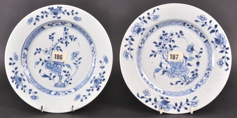 A PAIR OF 18TH CENTURY CHINESE NANKING CARGO BLUE : A PAIR OF 18TH CENTURY CHINESE NANKING CARGO BLUE AND WHITE PLATES painted with flowers. Good condition. (No. 196 & 197). 9. 25ins diameter. Provenance: Christies, Lot 3670.