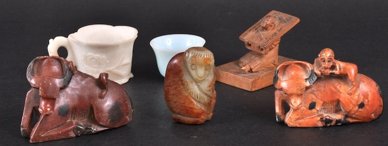 AN UNUSUAL EARLY 20TH CENTURY JAPANESE BOXWOOD FIG: AN UNUSUAL EARLY 20TH CENTURY JAPANESE BOXWOOD FIGURE OF A PRISONER together with two soapstone carvings etc. Minor faults. (6)