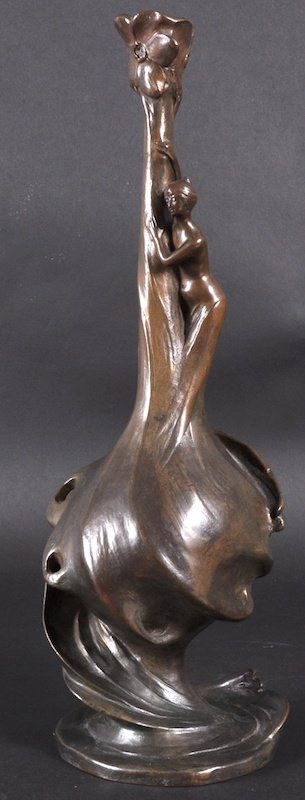 JULES JOUANT (Active 1852-1921) A GOOD ART NOUVEA: JULES JOUANT (Active 1852-1921) A GOOD ART NOUVEAU BRONZE BULBOUS VASE with slender neck with a female figure hanging on to the side. Signed JOUANT. 15ins high. See Illustration.
