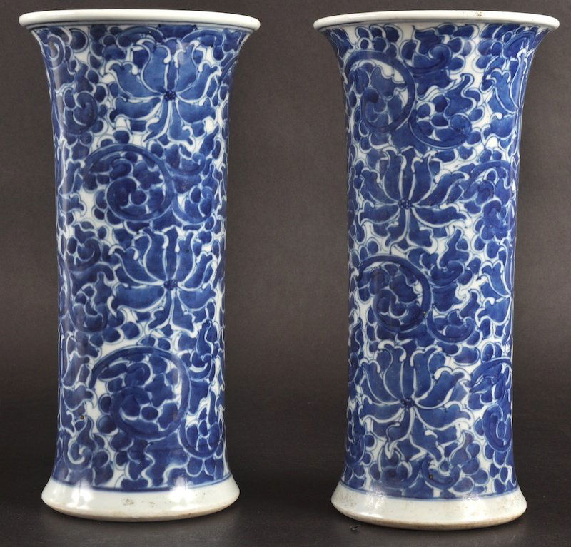 A PAIR OF LATE 19TH/20TH CENTURY CHINESE BLUE AND WH: A PAIR OF LATE 19TH/20TH CENTURY CHINESE BLUE AND WHITE VASES painted with floral sprays. Good condition. 10ins high.