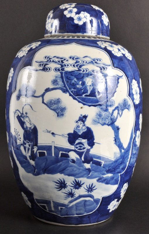 A 19TH CENTURY CHINESE BLUE AND WHITE GINGER JAR: A 19TH CENTURY CHINESE BLUE AND WHITE GINGER JAR AND COVER painted with figures standing within a fenced garden. Lid repaired, body good condition.16.75ins high.