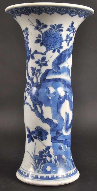 A CHINESE BLUE AND WHITE KANGXI PORCELAIN YEN YEN: A CHINESE BLUE AND WHITE KANGXI PORCELAIN YEN YEN VASE C1710 painted with birds perched amongst foliage. Minor nicks, hairline. 9. 5ins high.