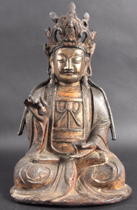 A GOOD 17TH/18TH CENTURY CHINESE LACQUERED BRONZE: A GOOD 17TH/18TH CENTURY CHINESE LACQUERED BRONZE FIGURE OF A BUDDHA modelled seated in a typical stance, seated upon a circular lotus base. Minor faults, surface losses. 12. 5ins high.