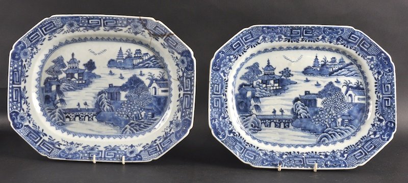 A PAIR OF 18TH CENTURY CHINESE EXPORT BLUE AND WH: A PAIR OF 18TH CENTURY CHINESE EXPORT BLUE AND WHITE DISHES together with another 18th century Export dish. Two repaired, one good condition. 13. 25ins wide. (3)