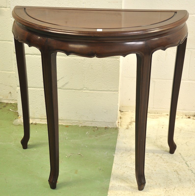 A 19TH CENTURY CHINESE HALF MOON REDWOOD ALTAR TAB: A 19TH CENTURY CHINESE HALF MOON REDWOOD ALTAR TABLE with moulded front. 3ft wide.