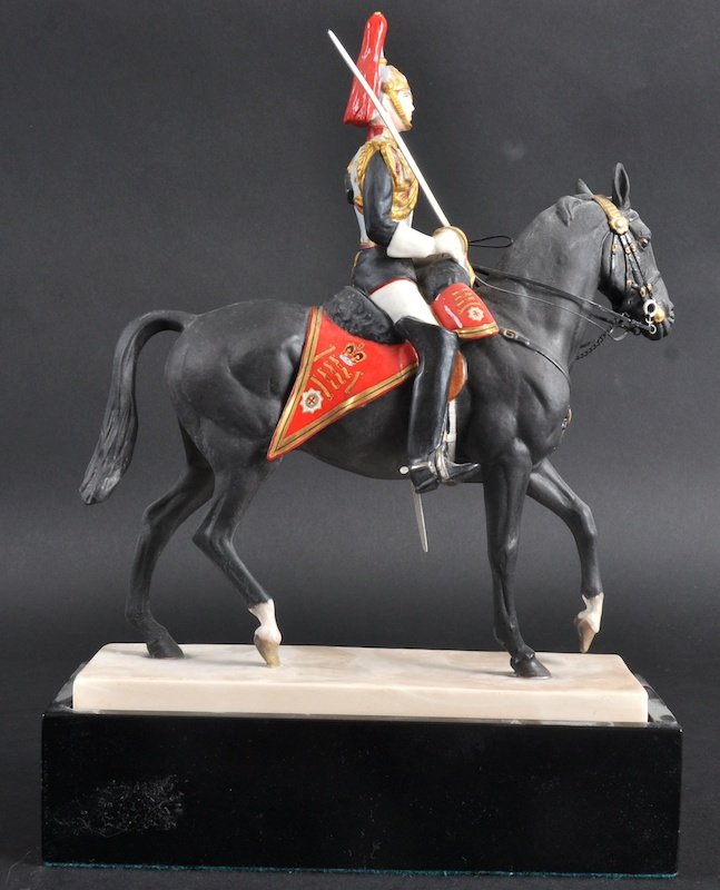 A RARE ROYAL WORCESTER HORSE GUARDS FIGURE BY DOR: A RARE ROYAL WORCESTER HORSE GUARDS FIGURE BY DORIS LINDER. Good condition. 6. 75ins wide.
