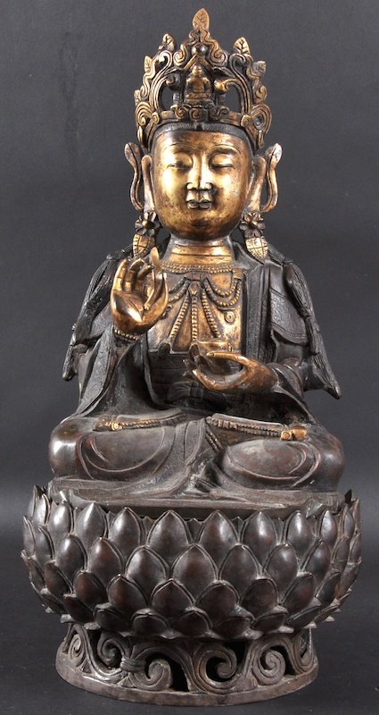 A GOOD CHINESE BRONZE FIGURE OF A SEATED BUDDHA O: A GOOD CHINESE BRONZE FIGURE OF A SEATED BUDDHA ON STAND probably 19th century, modelled in a typical stance upon a lotus pod base. Minor wear. 16. 5ins high.