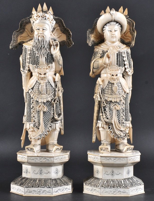 A PAIR OF EARLY 20TH CENTURY CHINESE IVORY FIGURE: A PAIR OF EARLY 20TH CENTURY CHINESE IVORY FIGURES C1900 carved as a Emperor and Empress, each modelled standing upon a hexagonal foliate incised base, Minor faults. 13. 5ins high.