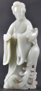 A FINE 17TH/18TH CENTURY CHINESE GREEN JADE CARVE: A FINE 17TH/18TH CENTURY CHINESE GREEN JADE CARVED FIGURE OF GUANYIN Kangxi/Qianlong, well carved modelled holding a rui within her hand, with a hoho bird by her side. Good condition.6.5ins high.