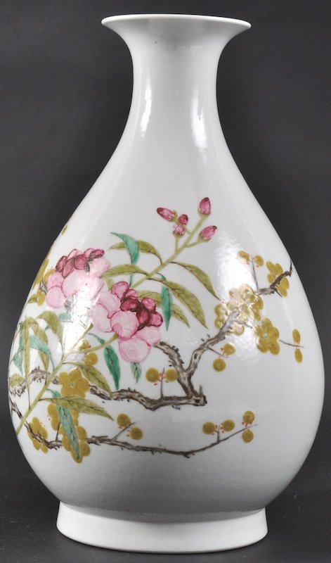 A GOOD CHINESE PORCELAIN ENAMELLED YUHUCHUMPING V: A GOOD CHINESE PORCELAIN ENAMELLED YUHUCHUMPING VASE Xuantong mark and possibly of the period, finely painted with bold foliate sprays. Minor enamel crackling. 12ins high.