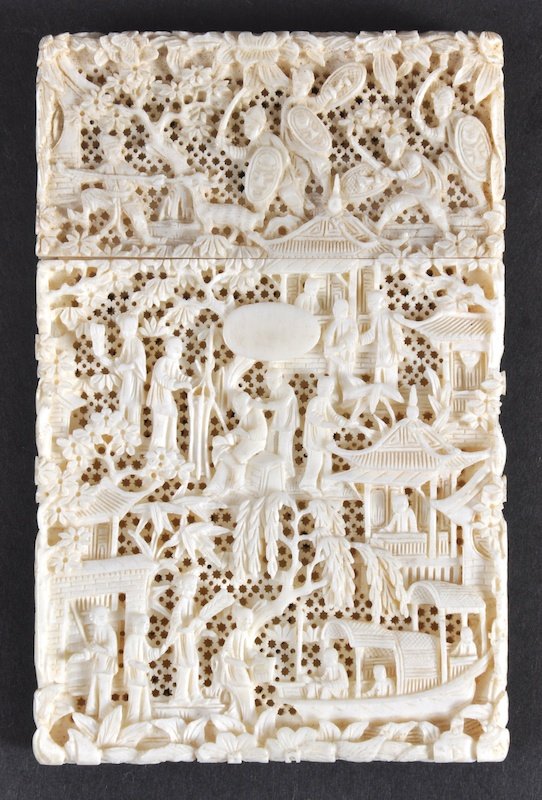 A 19TH CENTURY CHINESE CANTON IVORY CARD CASE AND: A 19TH CENTURY CHINESE CANTON IVORY CARD CASE AND COVER carved with figures, landscapes and buildings. Good condition.4.5ins x 2.75ins.