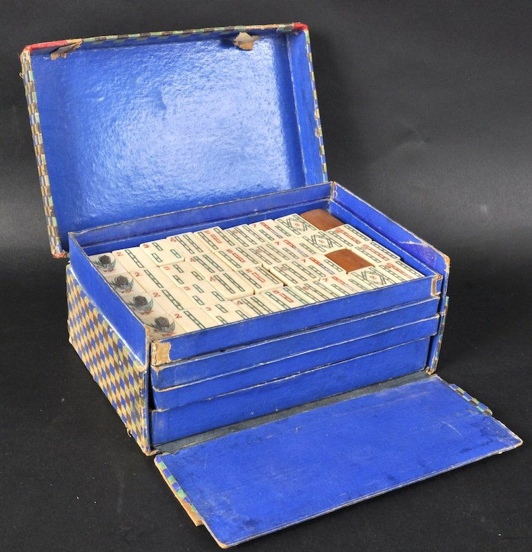 A BAMBOO AND IVORY MAH JONG SET in a card box imp: A BAMBOO AND IVORY MAH JONG SET in a card box imported by The Chad Valley Co.