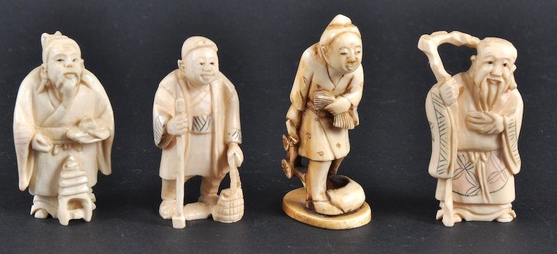 AN EARLY 20TH CENTURY JAPANESE IVORY NETSUKE toget: AN EARLY 20TH CENTURY JAPANESE IVORY NETSUKE together with three other carved ivory figures. Good condition. (4)
