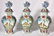 717: A SET OF THREE DELFT VASES AND COVERS, painted wi