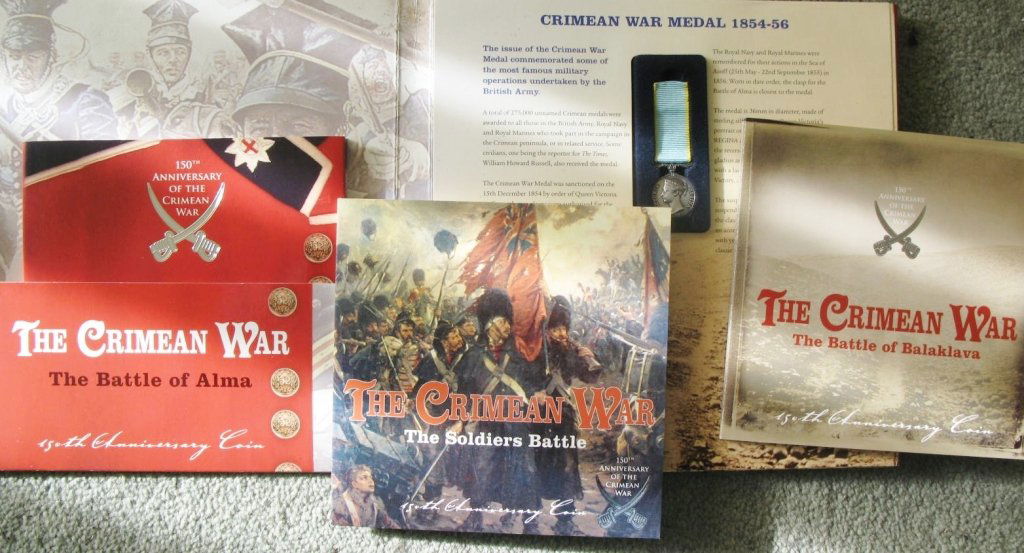 Crimean War Anniversary 2004, Royal Mint folder with 3 : Crimean War Anniversary 2004, Royal Mint folder with 3 x £5 Battle coins, mini Crimea medal, mint state