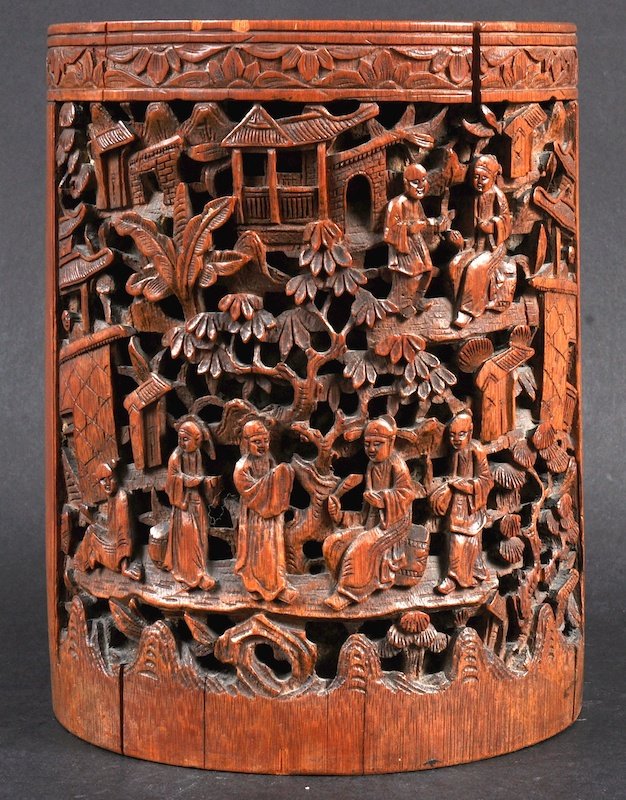 A 19TH CENTURY CHINESE CARVED BAMBOO CYLINDRICAL BRUSH : A 19TH CENTURY CHINESE CARVED BAMBOO CYLINDRICAL BRUSH POT carved with calligraphy and landscapes. Natural splits. 6.5ins high.