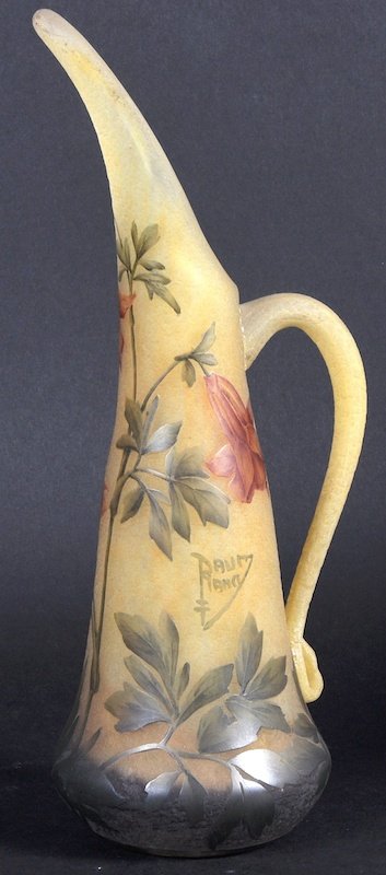 A “DAUM” NANCY GLASS CAMEO JUG decorated with orchids.: A “DAUM” NANCY GLASS CAMEO JUG decorated with orchids.9.5ins high. Signed DAUM, NANCY.