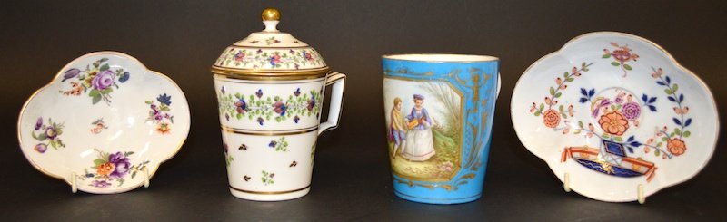 AN 18TH CENTURY FRENCH PORCELAIN CHOCOLATE CUP with bl: AN 18TH CENTURY FRENCH PORCELAIN CHOCOLATE CUP with blue ground, painted with panels of young lovers in a landscape, a French porcelain chocolate cup and cover painted with flowers and two Meissen sha