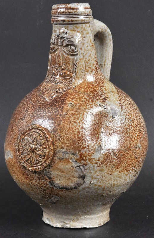 A 17TH CENTURY SALT GLAZED BELLARMINE JUG C1650 with ma