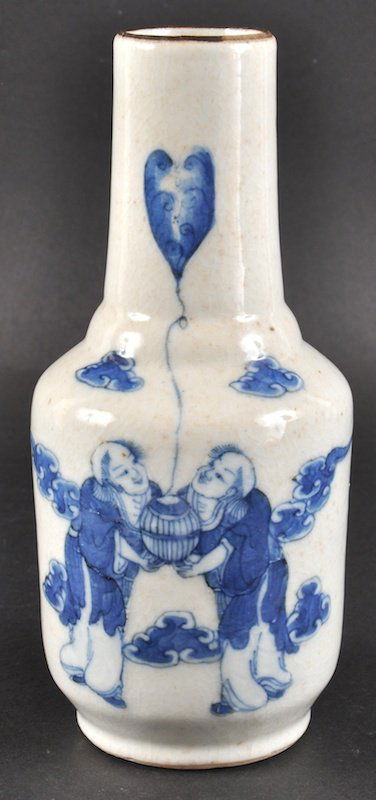 A 19TH CENTURY CHINESE BLUE AND WHITE VASE bearing Che: A 19TH CENTURY CHINESE BLUE AND WHITE VASE bearing Chenghua marks to base, painted with twins holding a balloon. Crazing.875ins high.