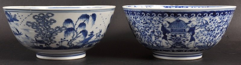 A 19TH CENTURY CHINESE BLUE AND WHITE BOWL bearing Kan: A 19TH CENTURY CHINESE BLUE AND WHITE BOWL bearing Kangxi marks to base, together with another bowl. One with nick, one with two hairlines. 7ins diameter. (2)