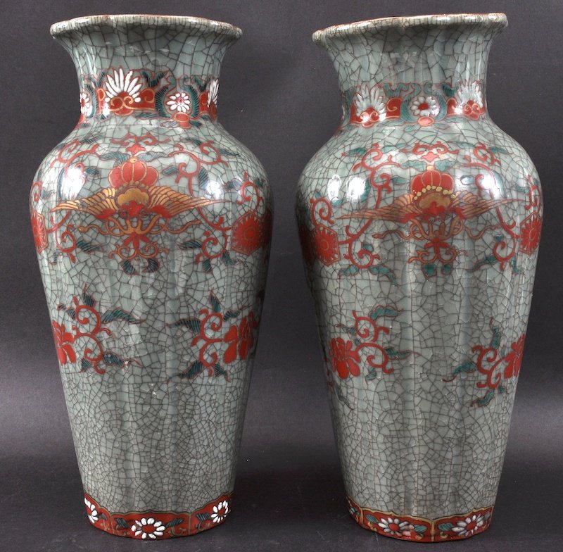 A PAIR OF EARLY 20TH CENTURY JAPANESE CRACKLED VASES en: A PAIR OF EARLY 20TH CENTURY JAPANESE CRACKLED VASES enamelled with bats and foliage. Good condition. 13.5ins high.