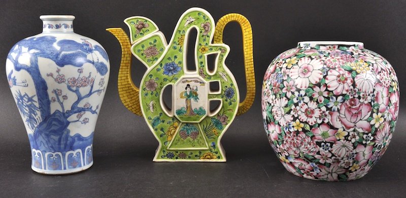 A CHINESE BLUE AND WHITE MEI PING VASE together with a : A CHINESE BLUE AND WHITE MEI PING VASE together with a floral ginger jar and S shaped teapot and cover. Minor fritting. Largest 7.75ins high. (3)