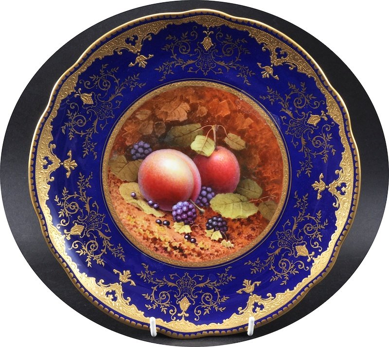 AN EARLY 20TH CENTURY COALPORT COBALT BLUE PLATE painte